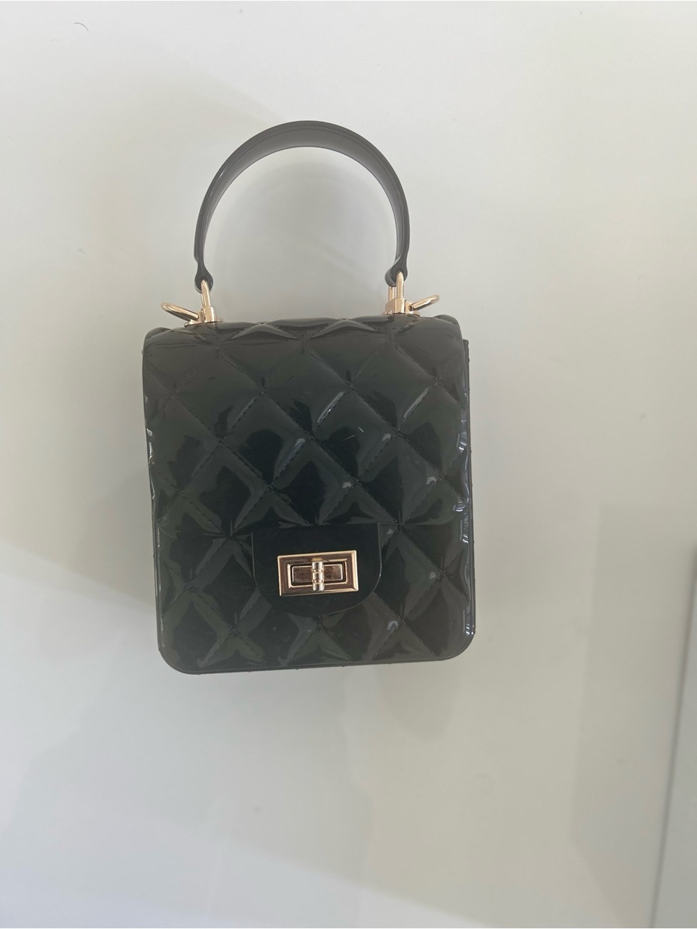 Black Quilted Top-Handle Women’s Bag with Gold Hardware
